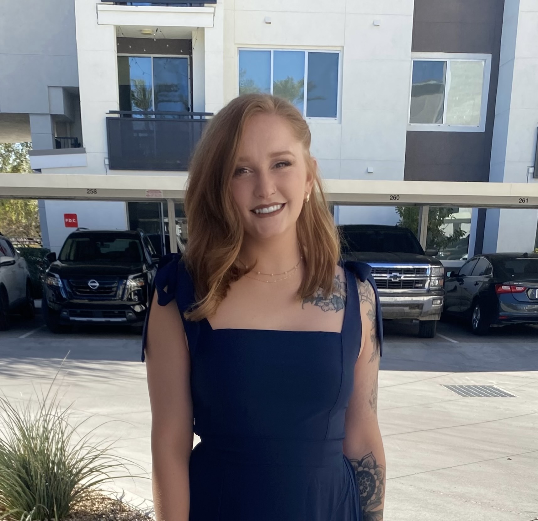 Headshot of Quality Irrigation & Landscaping Office Manager, Kayla